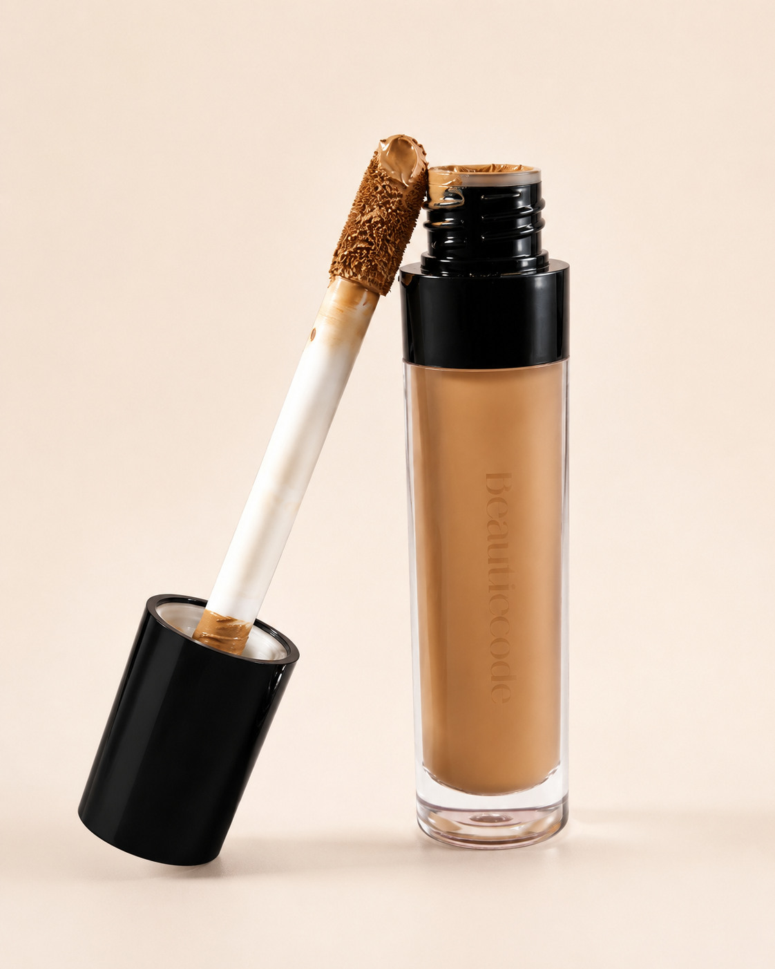 a medium shade concealer with its lid off leaning against the component with a large doe foot